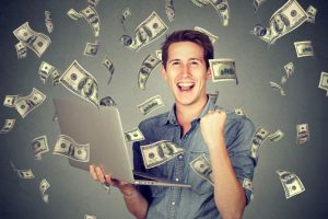 A man holding a laptop 